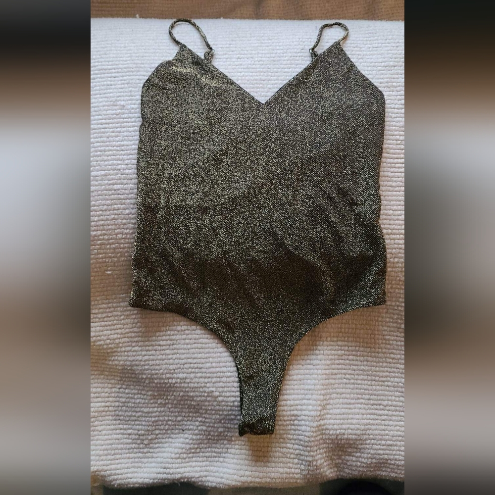 Gold body suit
